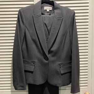 Calvin Klein dark gray women’s pant suit.